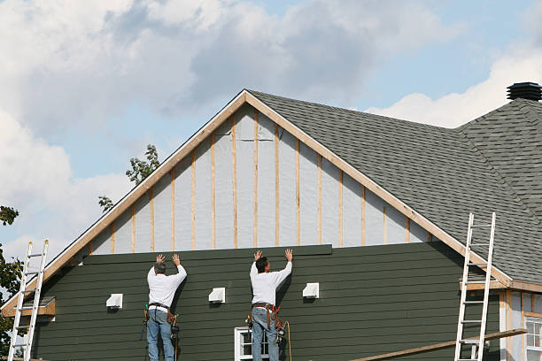 Professional Storm Damage Siding Repair technician working in Doylestown, PA